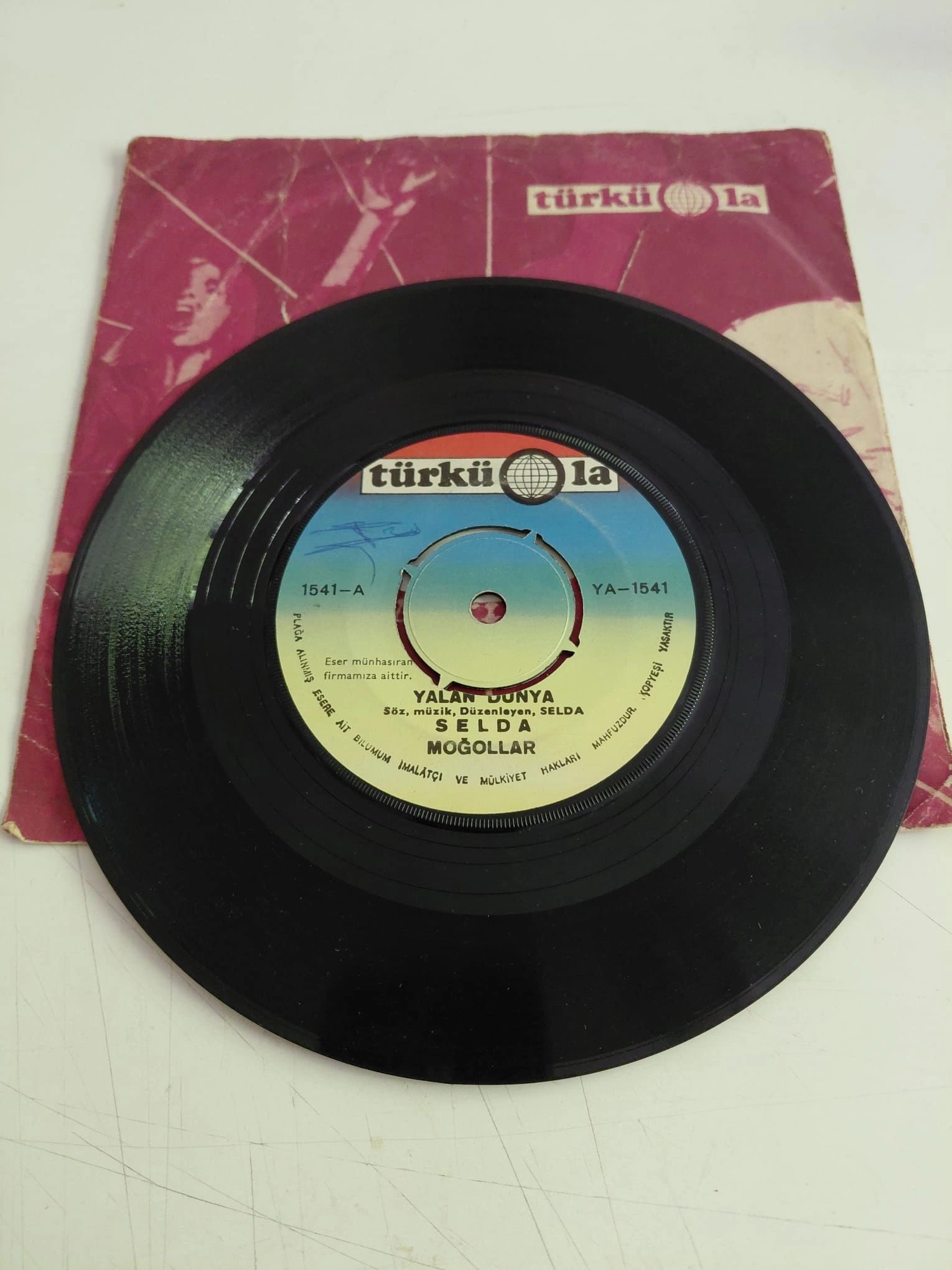 SELDA BAĞCAN / MOĞOLLAR  - Yalan Dünya / Kalenin Dibinde  1972 Türkiye Basım 45 lik Plak-2.el