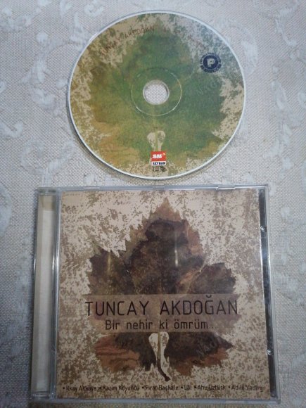 TUNCAY AKDOĞAN - BİR NEHİR Kİ ÖMRÜM   - TÜRKİYE   BASIM  ALBÜM CD