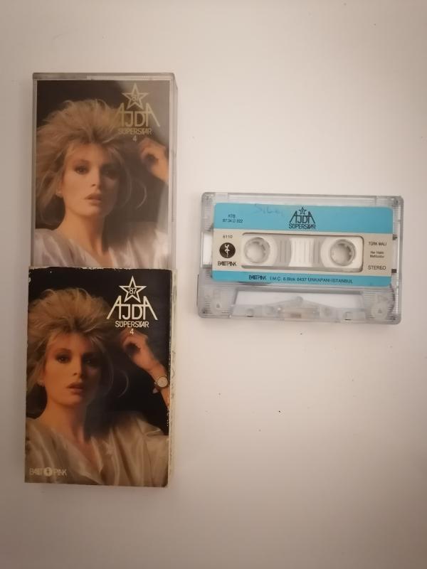 AJDA - SÜPERSTAR 4 - 1987 İLK BASIM KAĞITLI VE KARTON AMBALAJLI - (KASET)
