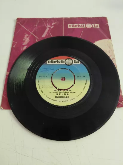 SELDA BAĞCAN / MOĞOLLAR  - Yalan Dünya / Kalenin Dibinde  1972 Türkiye Basım 45 lik Plak