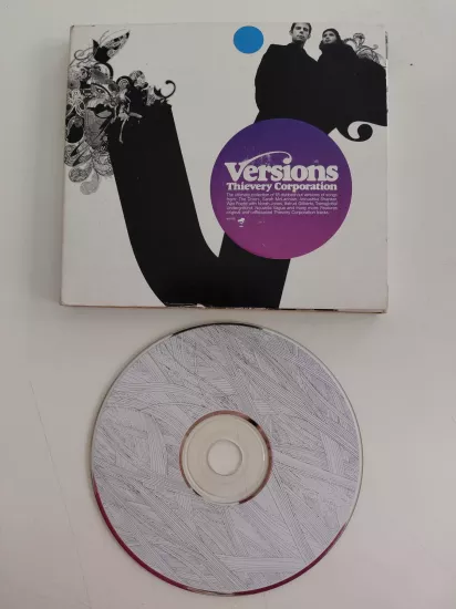 Thievery Corporation – Versions (The Doors ,Bebel Gilberto ) – 2006 USA  Basım - CD Albüm
