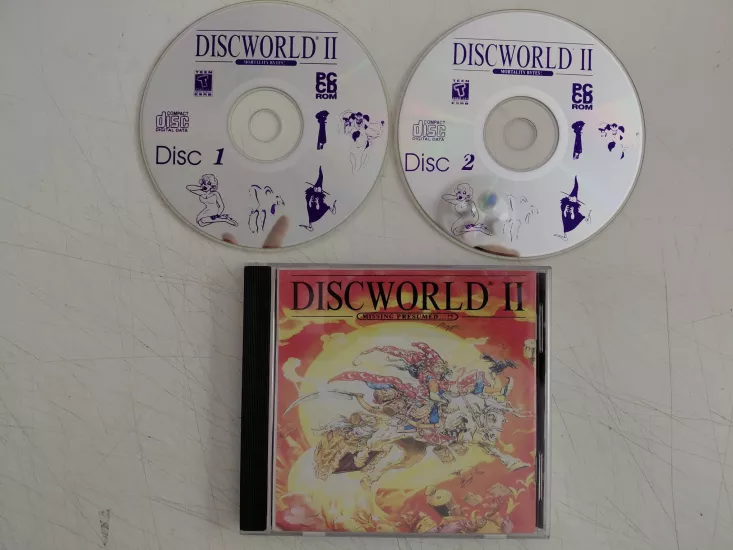Discworld II: Missing Presumed -  PC CD ROM (2 Disk)  ( Oyun )