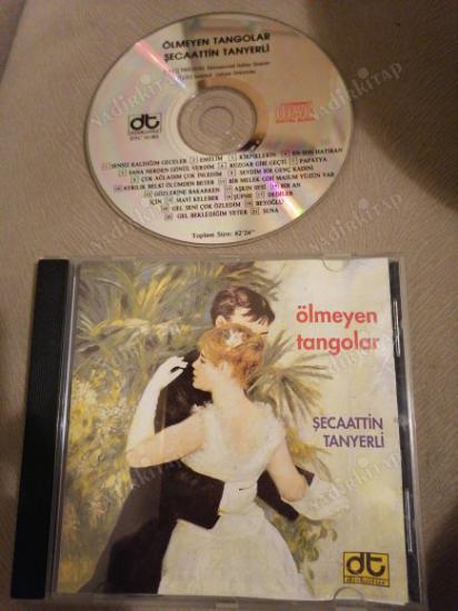 ŞECAATİN TANYERLİ - ÖLMEYEN TANGOLAR - 2000 TÜRKİYE BASIM ALBUM CD ( YEŞİL BANDROL )