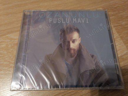 OZAN ÜNLÜ - PUSLU MAVİ - 2014  TÜRKİYE BASIM CD  ALBÜM - AÇILMAMIŞ AMBALAJINDA